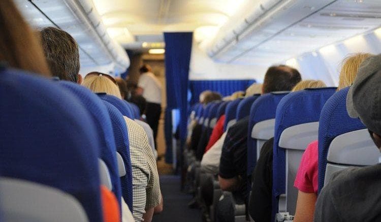 How a man who had lost breath was saved by passengers on flight?