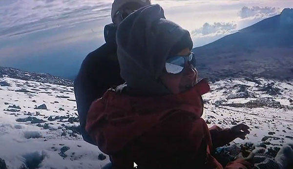 7 year old boy climbs Kilimanjaro peak
